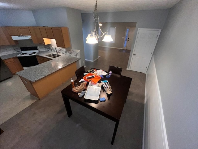 142 Benfield Cir, Cartersville, GA 30121 - kitchen with a notable chandelier, pendant lighting, kitchen peninsula, sink, and range with electric stovetop