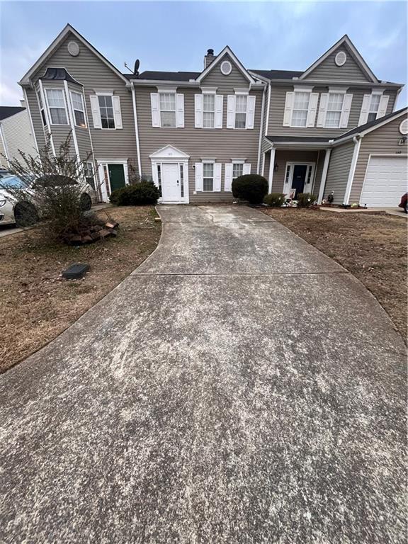 142 Benfield Cir, Cartersville, GA 30121 - view of property featuring a garage