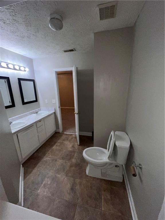 142 Benfield Cir, Cartersville, GA 30121 - bathroom with a textured ceiling and vanity