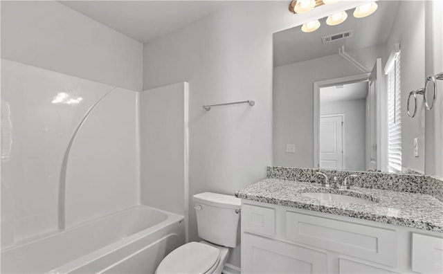 full bathroom featuring vanity, toilet, and  shower combination