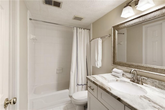 bathroom featuring shower / tub combo, visible vents, toilet, a textured ceiling, and vanity