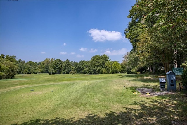 view of home's community featuring a yard