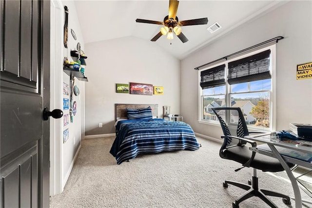 bedroom featuring a ceiling fan, visible vents, baseboards, lofted ceiling, and light colored carpet