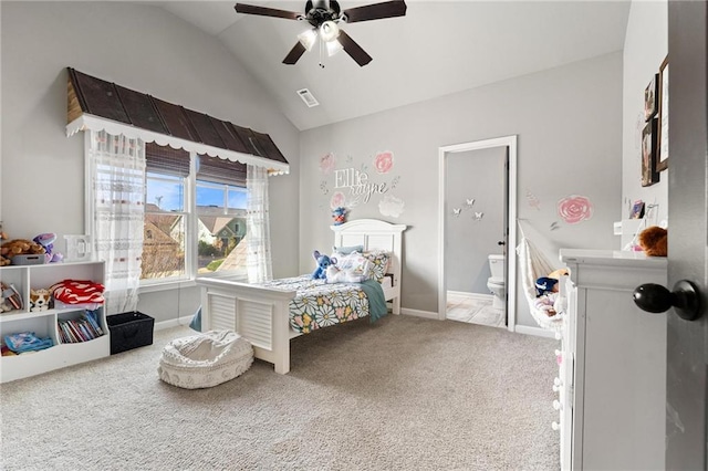 bedroom with visible vents, ensuite bath, carpet, ceiling fan, and vaulted ceiling