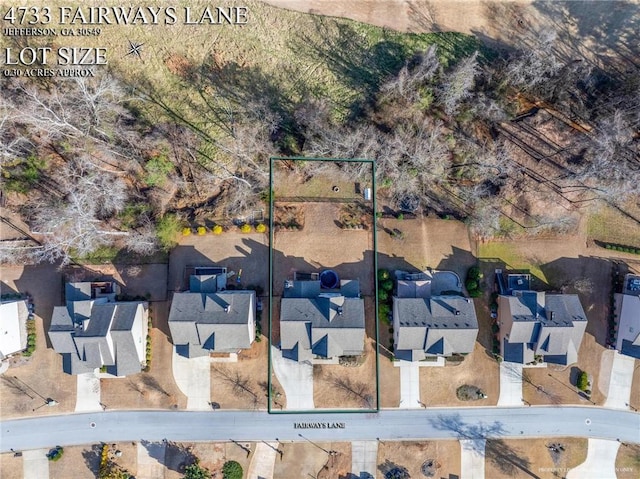 drone / aerial view featuring a residential view