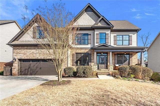 view of front of home with brick siding, concrete driveway, and an attached garage