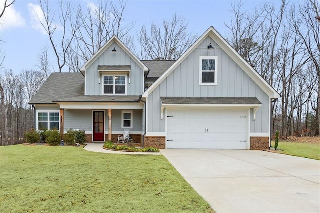 view of front facade featuring a front lawn, board and batten siding, and brick siding