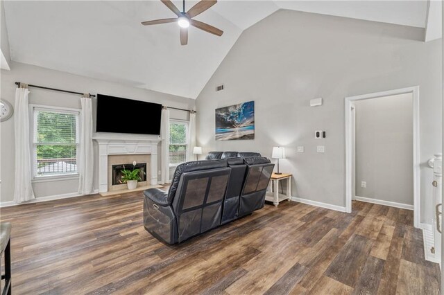 58 Hampton Forest Ct, Dahlonega, GA 30533 - living area with ceiling fan, plenty of natural light, wood finished floors, a fireplace with flush hearth, and high vaulted ceiling