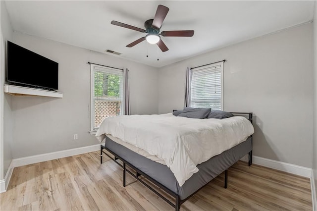 58 Hampton Forest Ct, Dahlonega, GA 30533 - bedroom with baseboards, light wood-type flooring, and ceiling fan