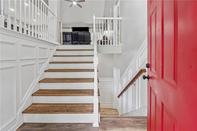 58 Hampton Forest Ct, Dahlonega, GA 30533 - staircase featuring a decorative wall, wood finished floors, and ceiling fan
