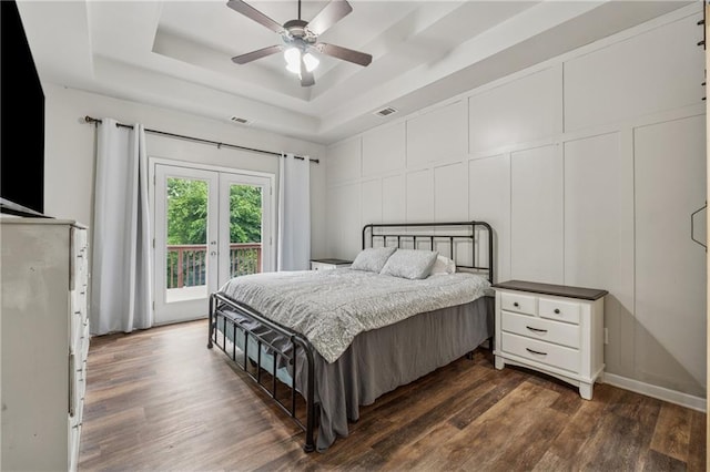 58 Hampton Forest Ct, Dahlonega, GA 30533 - bedroom featuring access to outside, a decorative wall, dark wood-type flooring, a raised ceiling, and ceiling fan