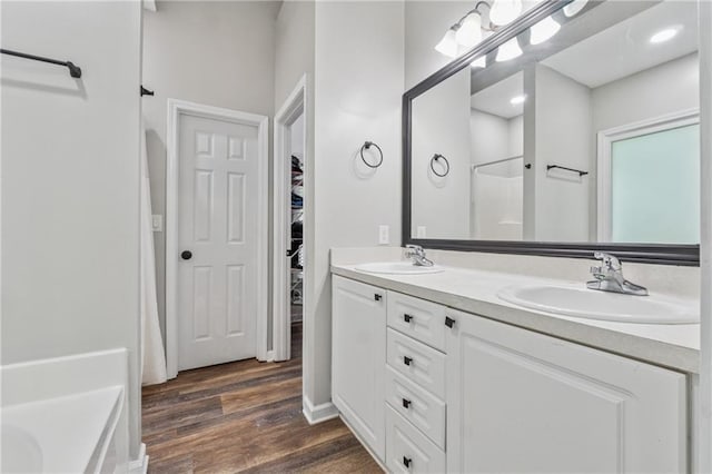 58 Hampton Forest Ct, Dahlonega, GA 30533 - full bath with double vanity, wood finished floors, a shower, and a spacious closet