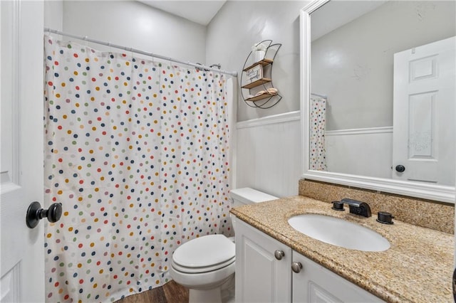 58 Hampton Forest Ct, Dahlonega, GA 30533 - bathroom with vanity, toilet, a shower with shower curtain, and a wainscoted wall