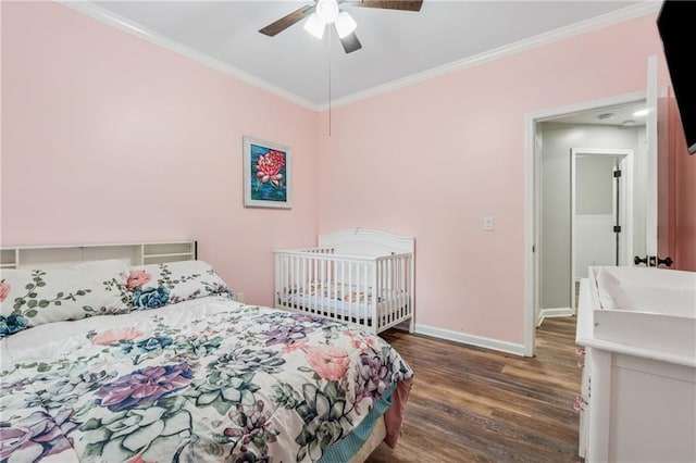 58 Hampton Forest Ct, Dahlonega, GA 30533 - bedroom with wood finished floors, crown molding, baseboards, and ceiling fan