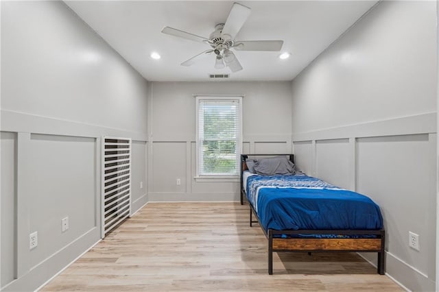 58 Hampton Forest Ct, Dahlonega, GA 30533 - bedroom with a decorative wall, recessed lighting, light wood finished floors, a wainscoted wall, and ceiling fan