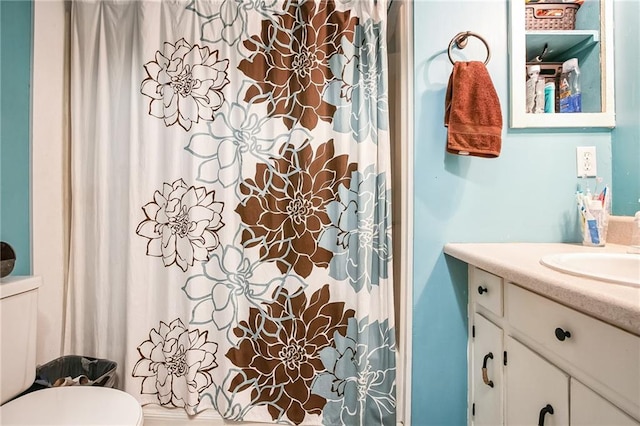 315 Charlotte Blvd, Stockbridge, GA 30281 - bathroom featuring vanity, toilet, and curtained shower