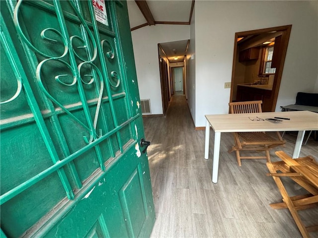 entryway with hardwood / wood-style flooring