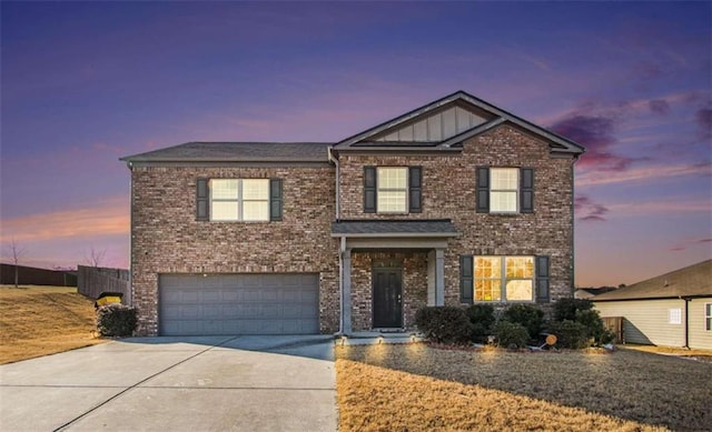 view of front of home with a garage