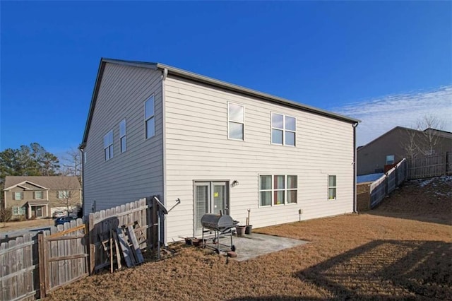 back of house featuring a patio