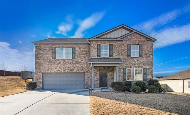 view of front of property with a garage