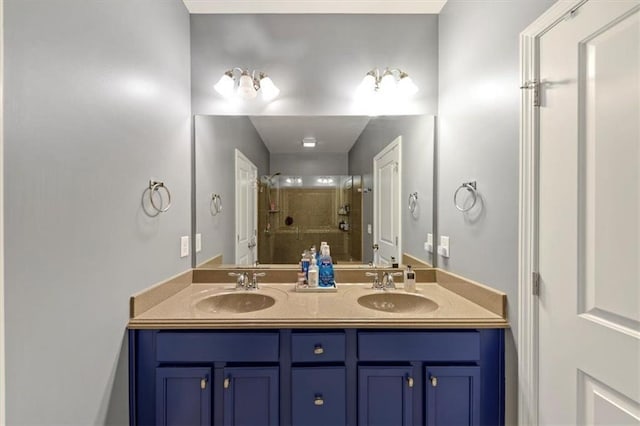 bathroom with vanity and an enclosed shower