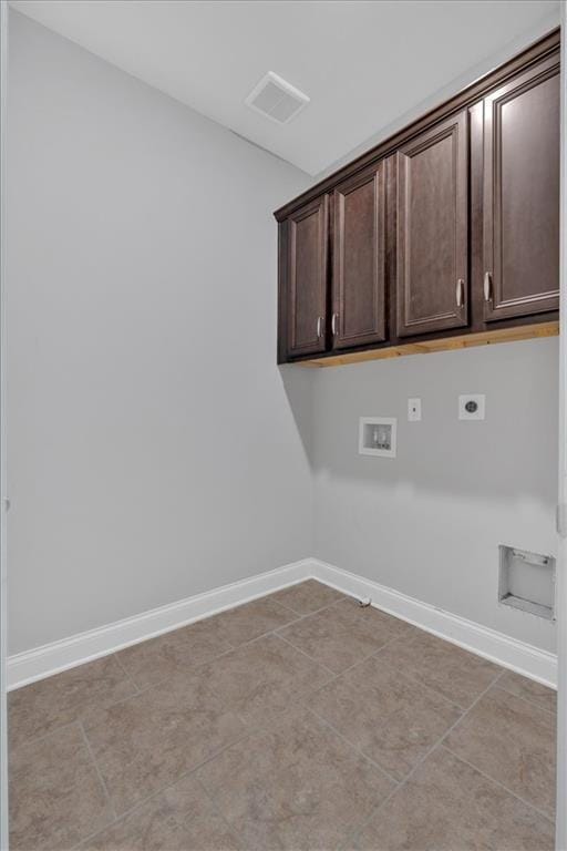 laundry area featuring hookup for an electric dryer, baseboards, visible vents, hookup for a washing machine, and cabinet space