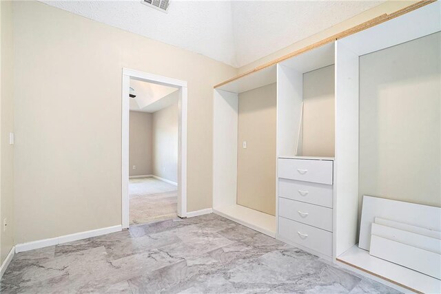 spacious closet featuring light tile patterned flooring