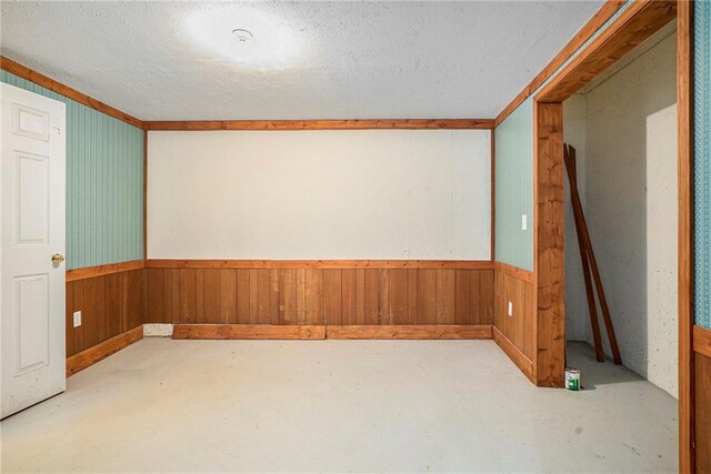 interior space featuring a textured ceiling