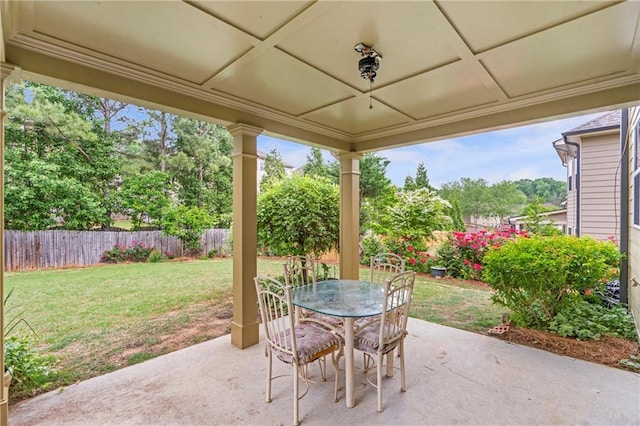 view of patio featuring a fenced backyard and outdoor dining area