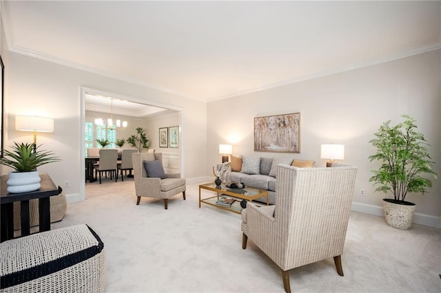 living room featuring crown molding, baseboards, a chandelier, and light colored carpet