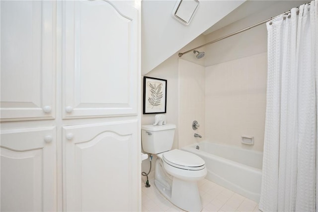 full bathroom with toilet, tile patterned flooring, and shower / tub combo with curtain