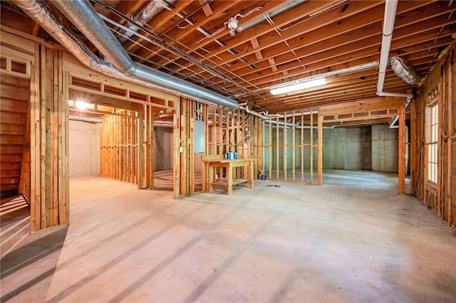 unfinished below grade area with electric panel