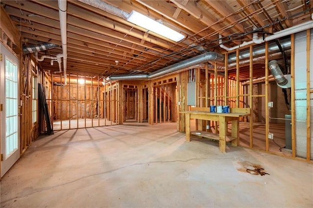 unfinished below grade area with electric panel