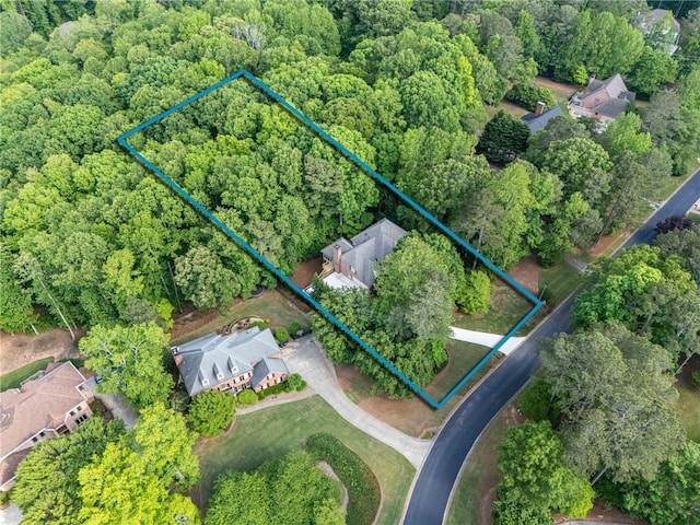 drone / aerial view with a forest view