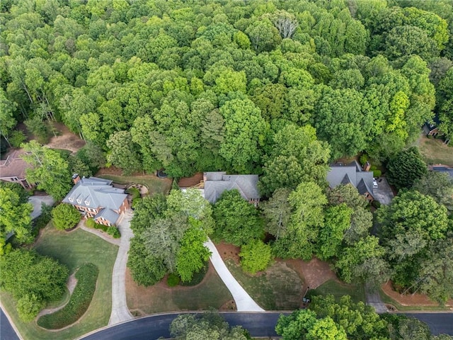 aerial view featuring a view of trees