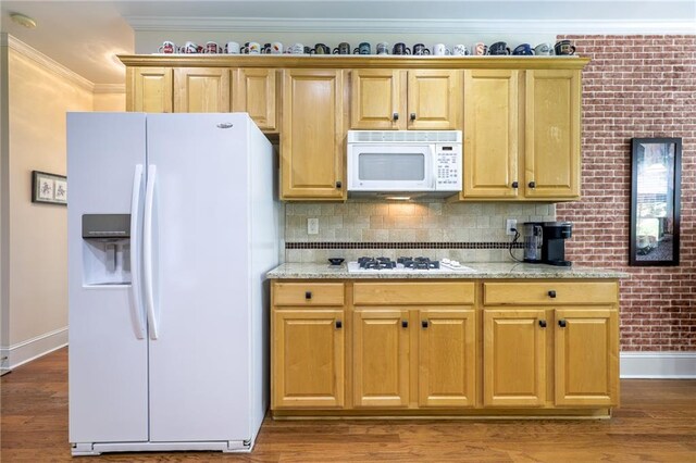 1997 Shaker Falls Ln, Lawrenceville, GA 30045 - kitchen featuring white appliances, baseboards, light stone counters, tasteful backsplash, and crown molding