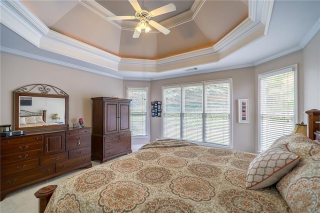 1997 Shaker Falls Ln, Lawrenceville, GA 30045 - bedroom featuring ornamental molding, a tray ceiling, ceiling fan, and light carpet