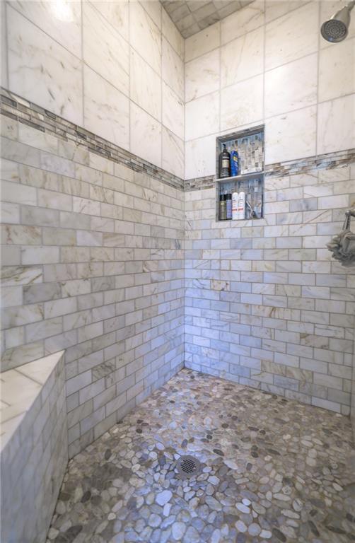 1997 Shaker Falls Ln, Lawrenceville, GA 30045 - full bath featuring a tile shower