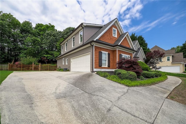 1997 Shaker Falls Ln, Lawrenceville, GA 30045 - view of home's exterior featuring concrete driveway and a garage