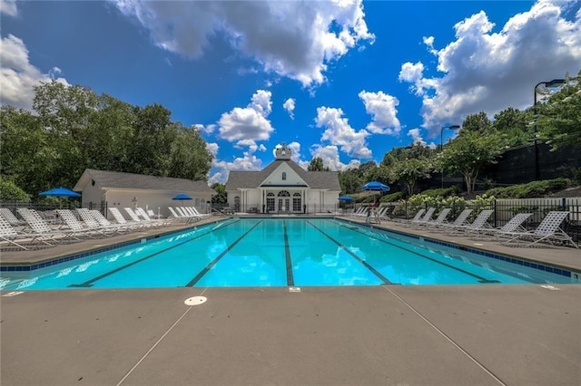 1997 Shaker Falls Ln, Lawrenceville, GA 30045 - community pool featuring a patio area