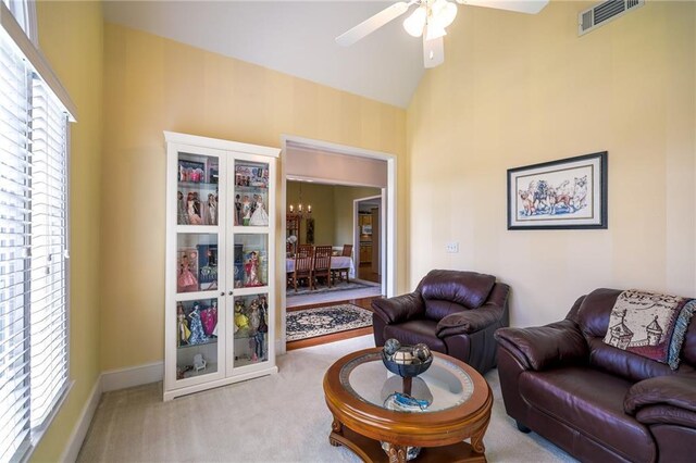 1997 Shaker Falls Ln, Lawrenceville, GA 30045 - carpeted living room featuring ceiling fan, a chandelier, and high vaulted ceiling
