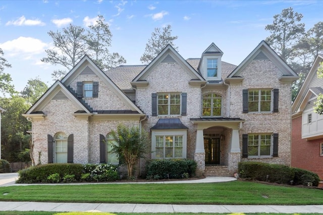 10565 Highgate Manor Ct, Duluth, GA 30097 - view of front of property featuring a front yard and brick siding