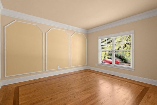 10565 Highgate Manor Ct, Duluth, GA 30097 - spare room with ornamental molding and wood finished floors