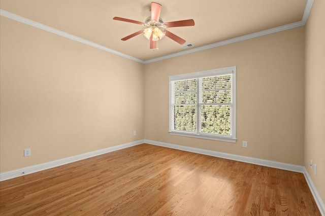 10565 Highgate Manor Ct, Duluth, GA 30097 - unfurnished room with light wood-style floors, ceiling fan, and ornamental molding