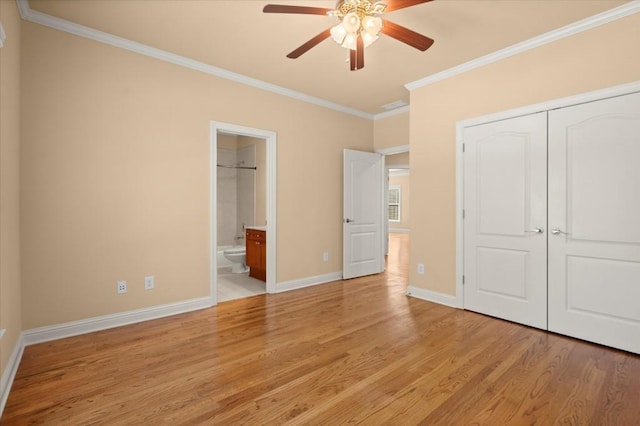 10565 Highgate Manor Ct, Duluth, GA 30097 - unfurnished bedroom with ornamental molding, light wood finished floors, a closet, ensuite bathroom, and a ceiling fan