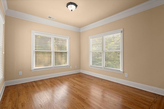 10565 Highgate Manor Ct, Duluth, GA 30097 - spare room with ornamental molding and wood finished floors