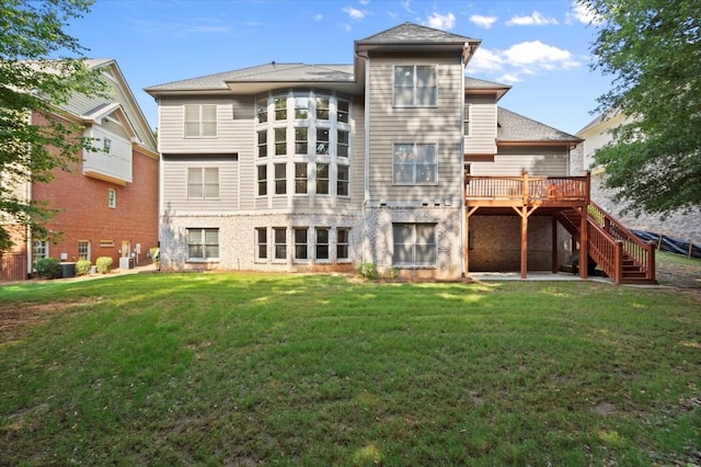 10565 Highgate Manor Ct, Duluth, GA 30097 - back of house featuring stairs, a wooden deck, a lawn, and brick siding