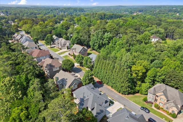 10565 Highgate Manor Ct, Duluth, GA 30097 - view of property location with a heavily wooded area and nearby suburban area