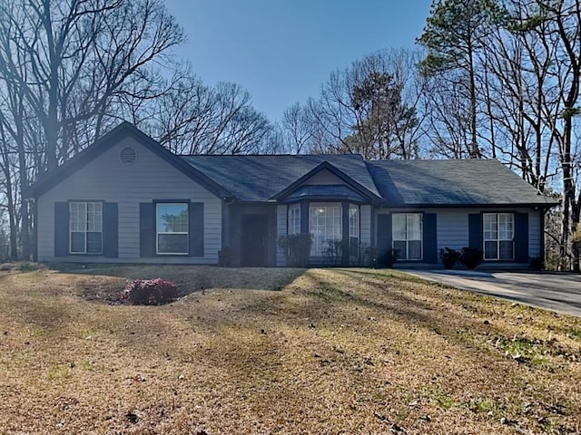4465 Kent Rd, Atlanta, GA 30337 - ranch-style house with a front lawn