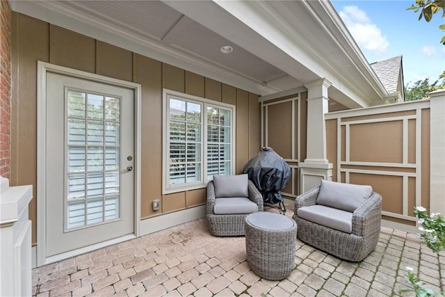 view of patio featuring a grill